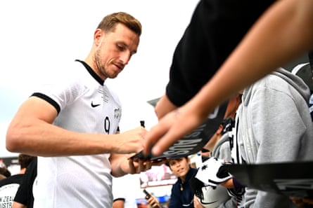 Wood signs autographs after winning a friendly against Australia at Eden Park in 2022