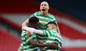 Edouard celebrates with team mates Brown and Elyounoussi.