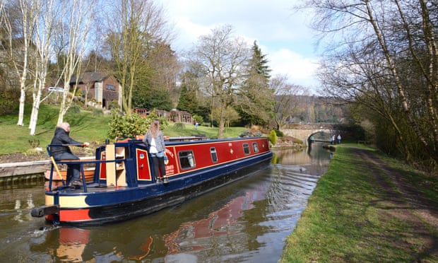 A narrow boat in the Peak District on the Caldon Canal between Stoke-on-Trent and Leek.