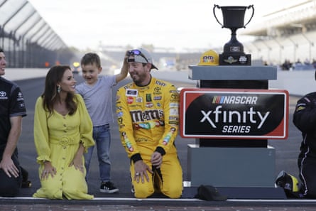 Kyle Busch with family after winning a 2019 race at Indianapolis Motor Speedway.