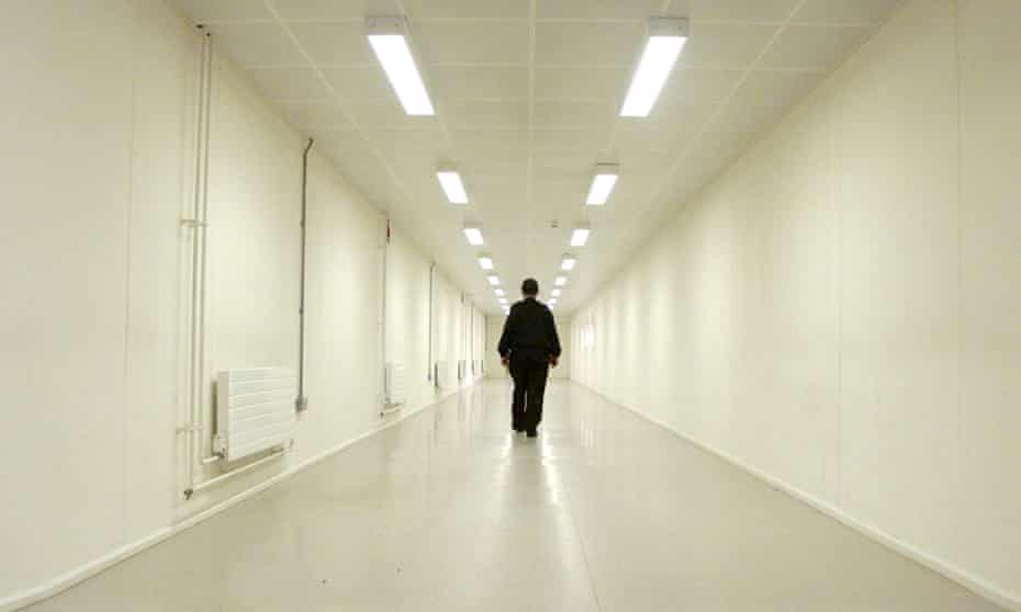 A security officer walks down one of the corridors of Yarl’s Wood Immigration Removal Centre.