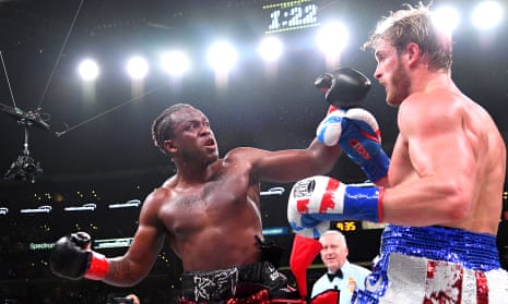 KSI (left) and Logan Paul exchange punches during their fight at Staples Center in Los Angeles