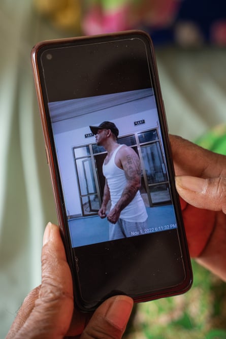 iphone showing photo of a burly man