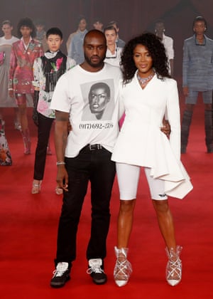 Supermodel Naomi Campbell and Abloh acknowledge the public at the end of the Off-White women’s 2018 spring/summer ready-to-wear collection fashion show in Paris
