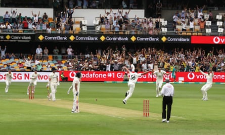 Australian Mitchell Starc runs away in celebration after taking Rory Burns' wicket with the 2021-22 Ashes' first ball