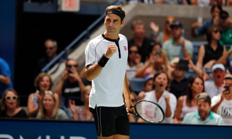 Roger Federer celebrates after defeating David Goffin in straight sets.