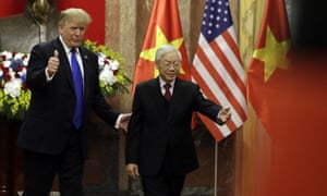Donald Trump meets Vietnamese President Nguyen Phu Trong at the Presidential Palace in Hanoi.