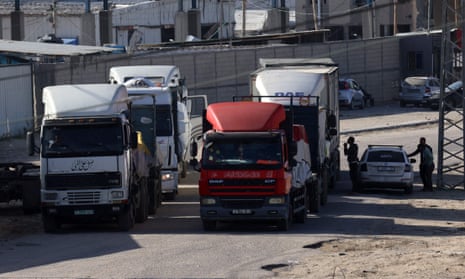 Trucks carrying humanitarian aid enter Gaza