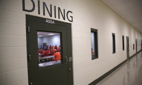 Immigrant detainees eat lunch at the Adelanto Detention facility in Adelanto, California. 