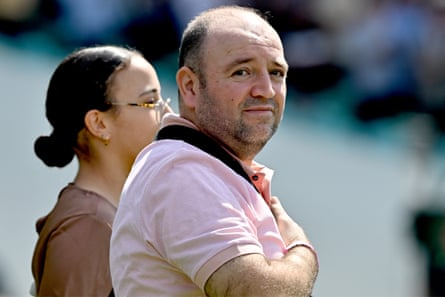Ahmed al Ahmed, the man who tackled and disarmed one of the Bondi beach attackers, stands for the national anthems at the fifth Ashes test match