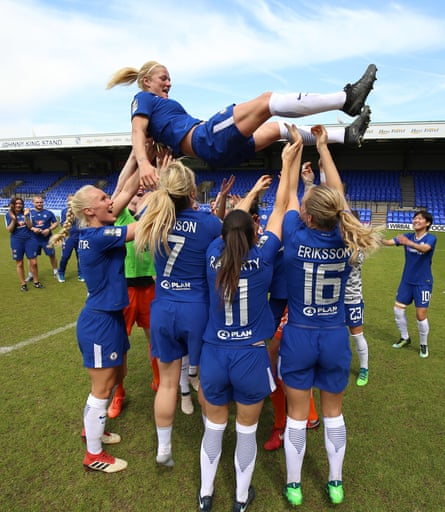 Katie Chapman is thrown into the air by her Chelsea teammates after her final game in 2018.