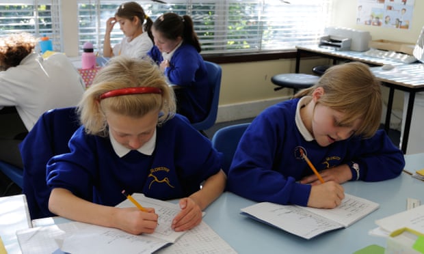 Primary school children working in a classroom
