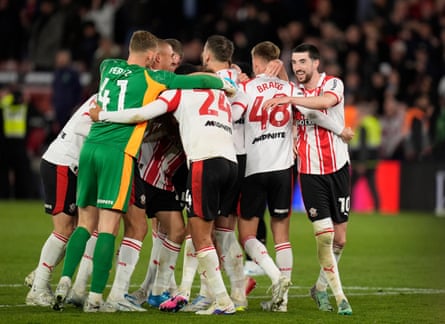 Southampton players celebrate at the final whistle after the Championship play off semi-final at St Mary’s Stadium.