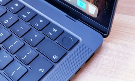 The Touch ID sensor in the power button of an Apple MacBook Pro M4.
