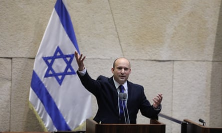 Naftali Bennett speaks during a special voting session on the formation of a new coalition government at the Knesset, Israeli parliament, in Jerusalem.