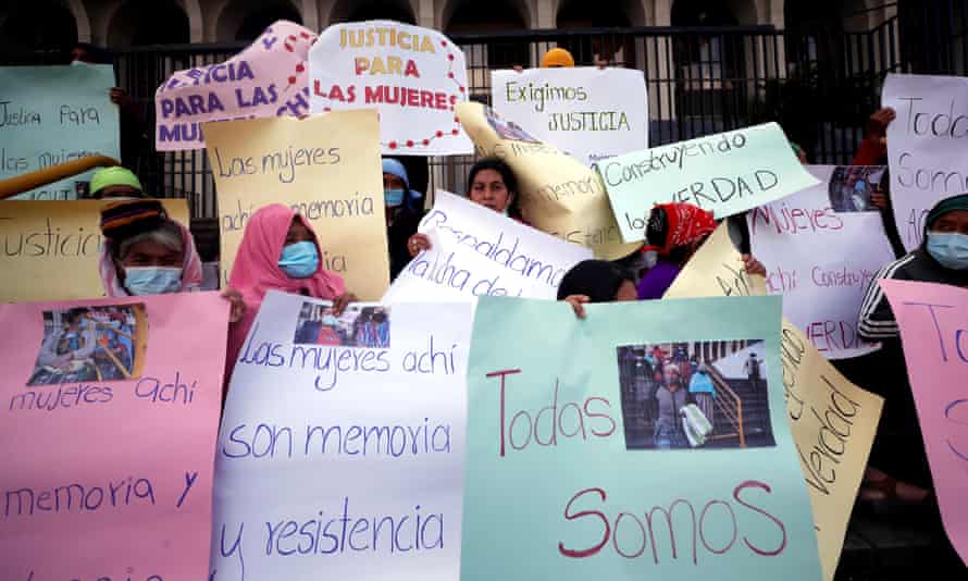 Achi women await a court's verdict on the case of five paramilitaries accused of sexually assaulting 36 indigenous women during Guatemala's civil war