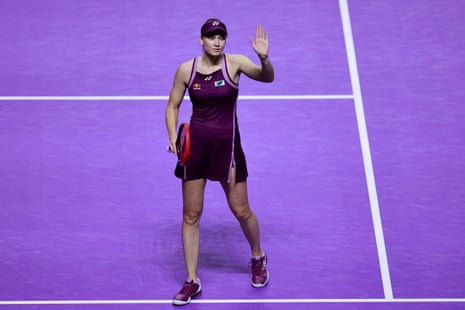 Elena Rybakina waves after winning her group stage match against Iga Swiatek