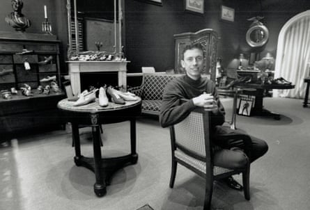 A black-and-white image of Patrick Cox in his Toronto store in 1992.
