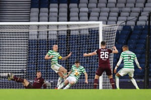Christie and Brown attempt to block Kingsley’s (not pictured) header.