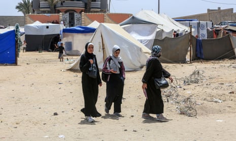 Palestinians forced to live in makeshift tents in the Nuseirat refugee camp in central Gaza.