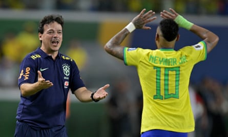 Fernando Diniz celebrates with Neymar as Brazil beat Bolivia 5-1.
