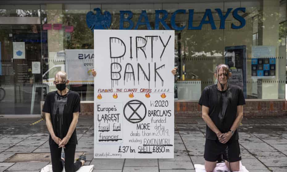 A protest against the financing of fossil fuel companies outside a branch of Barclays bank in St Alban's in July.