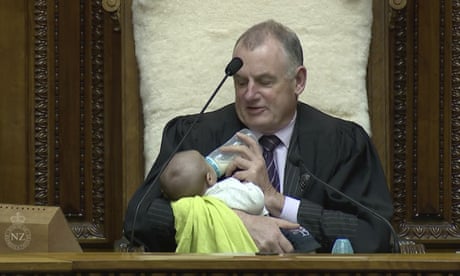 New Zealand House Speaker Trevor Mallard bottle-feeds lawmaker Tamati Coffey’s baby while presiding over a debate in parliament
