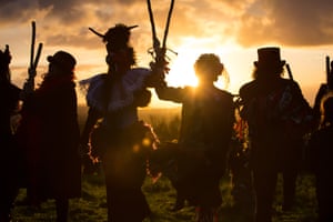 The Glastonbury border morris dance at sunset.