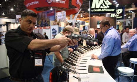 An attendee at the NSSF’s Shot show in Las Vegas. The NSSF has expanded its legal and lobbying spending to fight gun-control efforts nationwide.