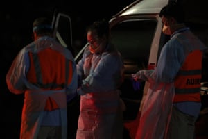 Australian medical assistance (Ausmat) staff prepare to greet the evacuees.