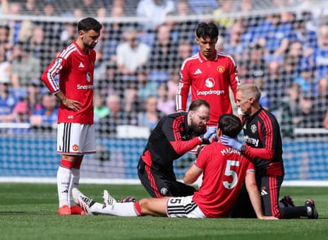 Manchester United's Harry Maguire receives treatment.