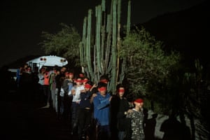 Mexican high school students reenact a night march that many migrants made to the United States. The march was organized by Parque EcoAlberto in El Alberto.