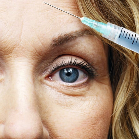 A close up of a toxin needle in front of a person’s forehead