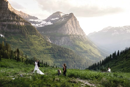 Brides and grooms have pictures taken at Big Bend at Glacier national park.