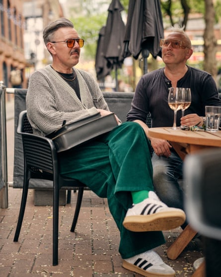 Two men, David and Chris, enjoy a drink on Canal Street. Manchester