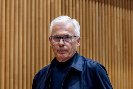 An older man wearing glasses