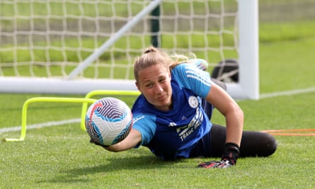 The Leicester City goalkeeper Janina Leitzig dives to save a shot during a training session in August