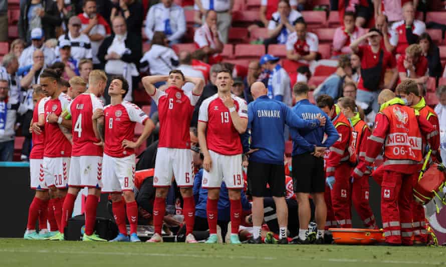 Christian Eriksen collapsed and the stadium fell silent in horror | Christian  Eriksen | The Guardian