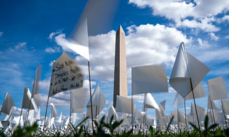 People visit the In America: Remember public art installation near the Washington Monument on the National Mall in Washington DC.