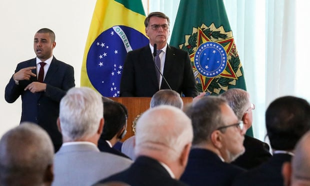 Jair Bolsonaro addresses foreign diplomats during his speech at the presidential palace