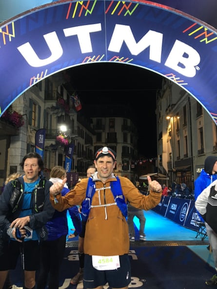 Setting the pace: Adharanand Finn crosses the finish line in the middle of the night