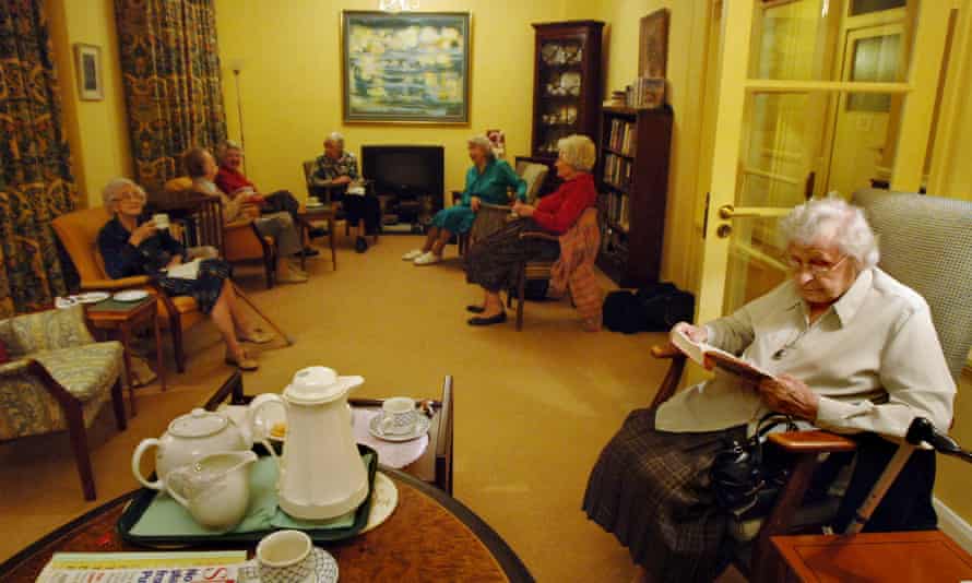 Mary Feilding residents having afternoon tea in the library.
