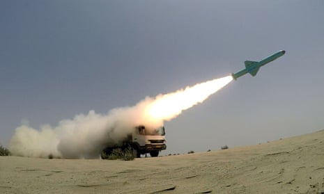 An Iranian-made missile is fired during war games in June.