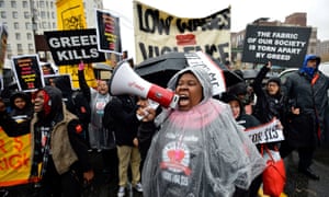 Workers
in Harlem at a minimum wage rally. While New York and California
have passes laws to raise the minimum wage to $15, Alabama’s is
stuck at $7.25.