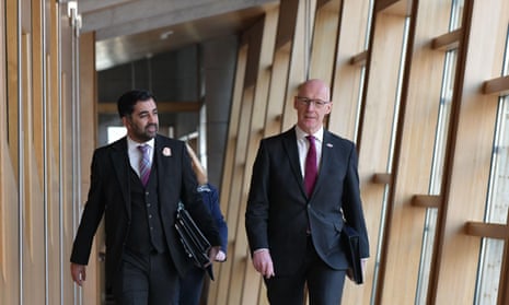 Humza Yousaf (left) and John Swinney arrive for First Minister’s Questions at the Scottish Parliament in 2022.