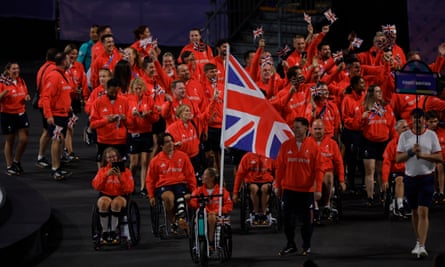 Great Britain flagbearers Lucy Shuker and Terry Bywater with the athletes as ParalympicsGB arrive for the opening ceremony