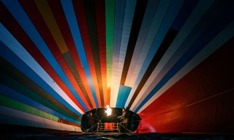The patchwork hot-air balloon is inflated.