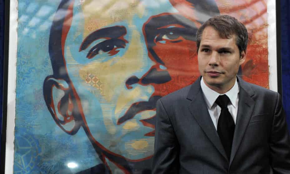 Shepard Fairey stands alongside his portrait of then US president-elect Barack Obama before it was installed at the National Portrait Gallery in Washington DC.