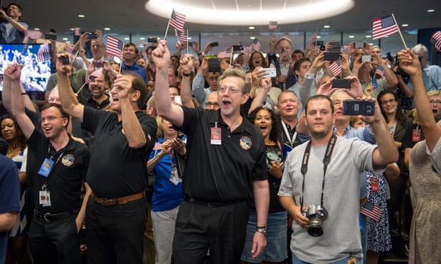 New Horizons team members count down to the spacecraft’s closest approach to Pluto in July 2015