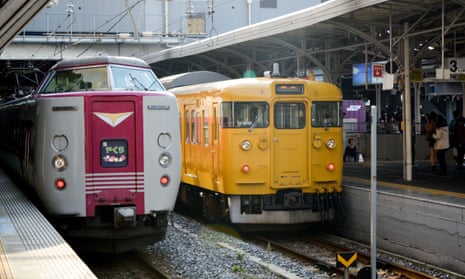 A 381 series train and a JR suburban train series 115-2000 at Kurashiki railway station, Japan